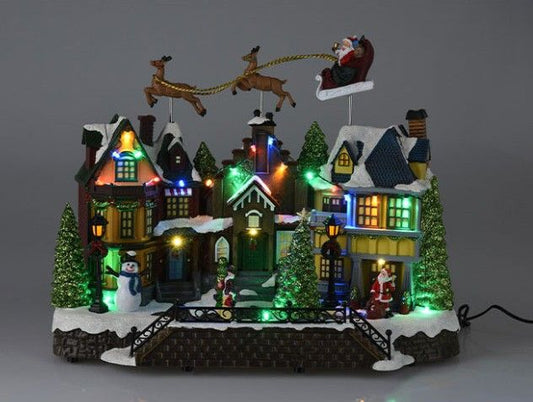 Kerstdorp Vliegende Arreslee - 35 Cm - Led En Muziek